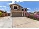 Beautiful home with a spacious driveway, a two-car garage and mature landscaping in a suburban setting at 3730 S Chaparral Rd, Apache Junction, AZ 85119