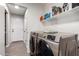 The laundry room includes new stainless steel appliances at 3730 S Chaparral Rd, Apache Junction, AZ 85119