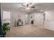 Bright and open loft area featuring neutral carpeting, doorways, and ample space at 3730 S Chaparral Rd, Apache Junction, AZ 85119