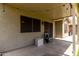 Relaxing covered patio with string lights, perfect for outdoor seating and enjoying the fresh air at 3730 S Chaparral Rd, Apache Junction, AZ 85119