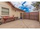 Spacious backyard with potential for outdoor activities featuring alley access through a gated entrance at 3756 E Clovis Ave, Mesa, AZ 85206