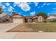 Charming single-story home with a well-manicured lawn and inviting curb appeal at 3756 E Clovis Ave, Mesa, AZ 85206