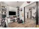 Spacious living room featuring an open floor plan, wood floors, and modern furniture at 3756 E Clovis Ave, Mesa, AZ 85206