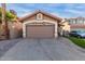 Charming home with a two-car garage and a beautifully paved driveway at 4106 E Muirwood Dr, Phoenix, AZ 85048