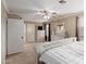 Bright main bedroom with neutral tones, a ceiling fan, and ample space at 4106 E Muirwood Dr, Phoenix, AZ 85048