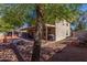 Large backyard with patio, grill, hot tub, and trampoline, offering plenty of room for outdoor activities at 424 W Midland Ln, Gilbert, AZ 85233