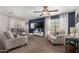 Cozy living room with stylish furnishings, ceiling fan, and natural light at 424 W Midland Ln, Gilbert, AZ 85233