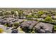 A serene aerial view of property showing tile roof, desert landscaping, and solar panels at 5226 S Fairchild Ln, Chandler, AZ 85249