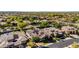 Great aerial view of the neighborhood featuring tile roofs and a home with solar panels at 5226 S Fairchild Ln, Chandler, AZ 85249