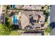 Expansive aerial view of home featuring a pool, hot tub, patio, and solar panels on a tile roof at 5226 S Fairchild Ln, Chandler, AZ 85249