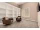 Cozy living room with built-in shelves and comfortable seating at 5226 S Fairchild Ln, Chandler, AZ 85249