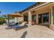 Relaxing patio with lounge chairs, umbrella, and views of the outdoor space at 5226 S Fairchild Ln, Chandler, AZ 85249