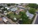 The home and backyard are featured in this aerial view, nestled in a quiet residential area at 549 N Olive --, Mesa, AZ 85203
