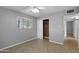 Bedroom with closet, ceiling fan, and natural light from window at 549 N Olive --, Mesa, AZ 85203