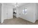 Bright dining room featuring tile floors and convenient access to the kitchen at 549 N Olive --, Mesa, AZ 85203