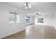 Bright living room features neutral color palette and tile flooring, offering a spacious and airy atmosphere at 549 N Olive --, Mesa, AZ 85203