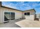 Private back patio area featuring sliding glass doors and ample space for outdoor seating at 5809 E Thomas Rd, Scottsdale, AZ 85251