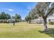 Expansive green common area with mature trees and manicured landscaping throughout the community at 5809 E Thomas Rd, Scottsdale, AZ 85251