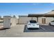 View of the parking area, showing assigned parking space and storage unit at 5809 E Thomas Rd, Scottsdale, AZ 85251