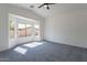 Bright bedroom with large windows and vaulted ceiling, creating a spacious atmosphere at 6432 S 23Rd Ave, Phoenix, AZ 85041