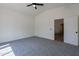 Bedroom with ceiling fan and an open doorway for convenient access at 6432 S 23Rd Ave, Phoenix, AZ 85041