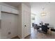 Dining area with gray chairs and modern chandelier at 6432 S 23Rd Ave, Phoenix, AZ 85041