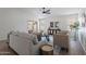 Bright living room featuring modern furniture and neutral color palette at 6432 S 23Rd Ave, Phoenix, AZ 85041