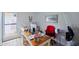 Bright home office featuring a large window and wood floors at 6626 N Majorca E Way, Phoenix, AZ 85016