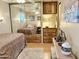 Bedroom featuring a comfortable bed, a large mirrored closet and a neutral color scheme at 7750 E Broadway Rd # 123, Mesa, AZ 85208