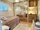 Bedroom featuring mirrored closet doors, neutral decor, and ample natural light at 7750 E Broadway Rd # 123, Mesa, AZ 85208