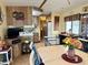 Open kitchen layout with updated appliances and ample counter space for meal preparation at 7750 E Broadway Rd # 123, Mesa, AZ 85208