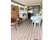 Covered outdoor patio offering a relaxing space with seating, decor, and a breezy atmosphere at 7750 E Broadway Rd # 123, Mesa, AZ 85208