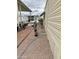 Manufactured home exterior featuring gravel landscaping and space between homes in community at 7750 E Broadway Rd # 123, Mesa, AZ 85208