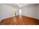 Bedroom with wood floors leads to the Primary bathroom at 812 E Piute Ave, Phoenix, AZ 85024