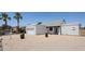 Inviting single-story home with a two-car garage and desert landscaping at 812 E Piute Ave, Phoenix, AZ 85024
