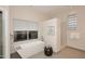 Bright bathroom featuring a soaking tub next to a picture window and a glass block window at 8230 E Via Del Sol Dr, Scottsdale, AZ 85255