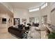 Bright living space with high ceilings features stylish furnishings and seamless transition to outdoor patio at 8230 E Via Del Sol Dr, Scottsdale, AZ 85255