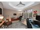 Home office with dual workspaces, neutral paint, bright recessed lighting, and storage at 8230 E Via Del Sol Dr, Scottsdale, AZ 85255