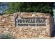 Pinnacle Peak Country Club Estates signage on an attractive stacked stone wall at 8230 E Via Del Sol Dr, Scottsdale, AZ 85255