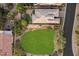 Aerial view of the property showcasing a well-maintained yard and tile roof at 8234 E Inca St, Mesa, AZ 85207