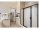 Bathroom with a glass enclosed shower, tile floors and view of closet at 8234 E Inca St, Mesa, AZ 85207
