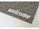 Stylish patterned doormat that reads 'welcome' at 8787 E Mountain View Rd # 2008, Scottsdale, AZ 85258