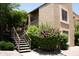 Charming exterior view of the building with landscaped surroundings at 8787 E Mountain View Rd # 2008, Scottsdale, AZ 85258