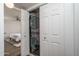 Convenient laundry closet featuring a stacked washer and dryer unit at 8787 E Mountain View Rd # 2008, Scottsdale, AZ 85258