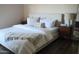 Comfortable main bedroom featuring a large bed with a plush duvet at 8787 E Mountain View Rd # 2008, Scottsdale, AZ 85258