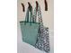 Stylish wall decor, featuring decorative wall hooks and colorful bags at 8787 E Mountain View Rd # 2008, Scottsdale, AZ 85258