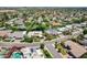 Expansive aerial view of a residential neighborhood featuring homes, pools, and lush landscaping at 8907 N 85Th Way, Scottsdale, AZ 85258