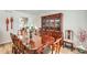 Elegant dining room with a large dining table, chairs, and a decorative china cabinet at 8907 N 85Th Way, Scottsdale, AZ 85258