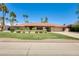 Charming home with a well-maintained lawn and vibrant landscaping, showcasing curb appeal at 8907 N 85Th Way, Scottsdale, AZ 85258