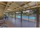 Covered patio overlooking a sparkling pool, framed by a secure fence, and a well-kept lawn at 8907 N 85Th Way, Scottsdale, AZ 85258